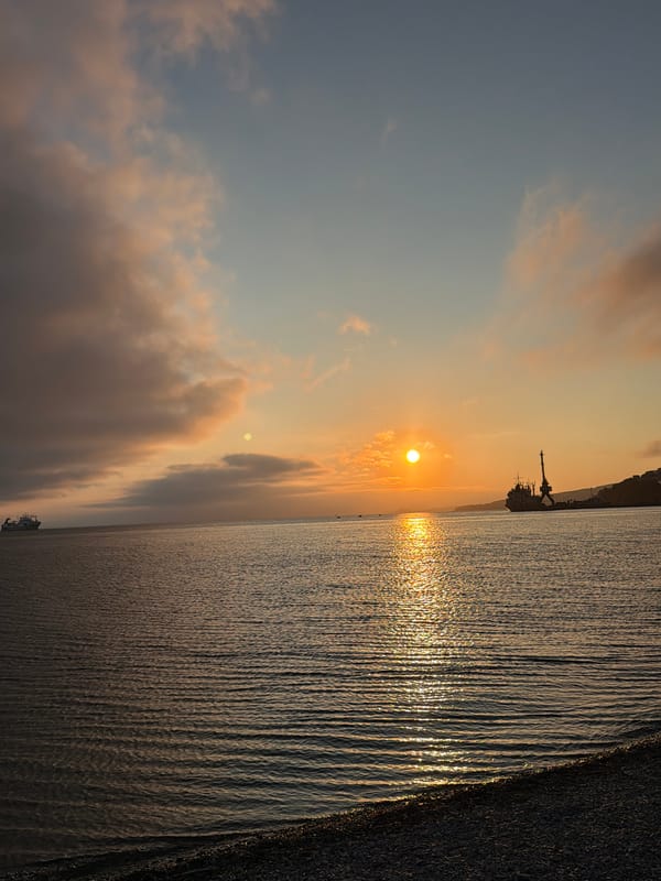 Sunset light and fishing boats on Avacha Bay, Kamchatka