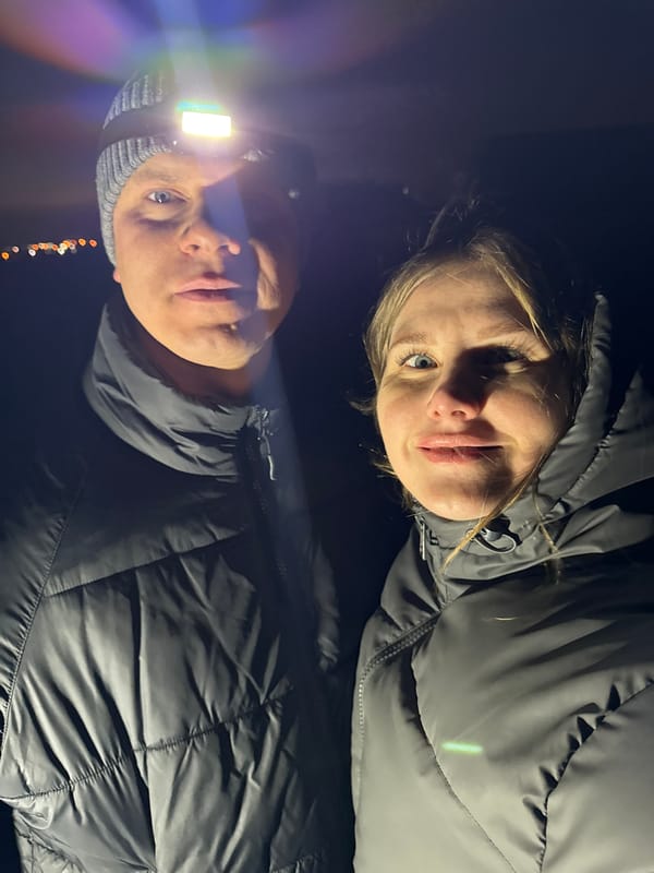 Two people photographed outdoors at night in Gorny, Russia