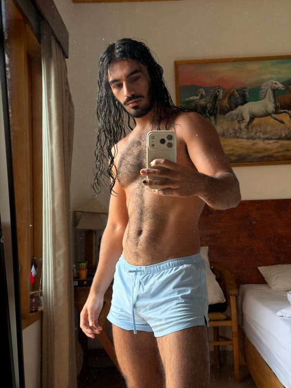 Post-swim mirror selfie in a North Kuta hotel room