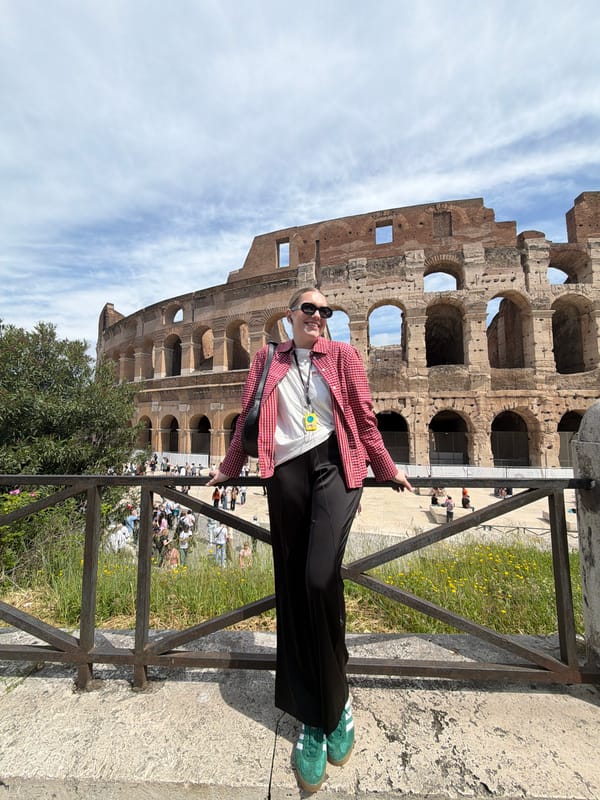 Tourists photographed at Rome's Colosseum on sunny April morning