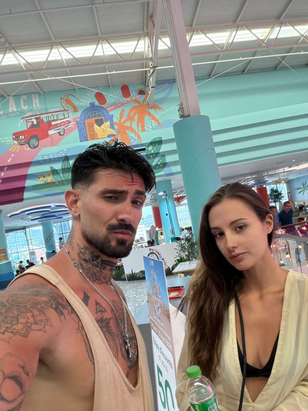 Couple Takes Indoor Selfie Against Mural in Thailand