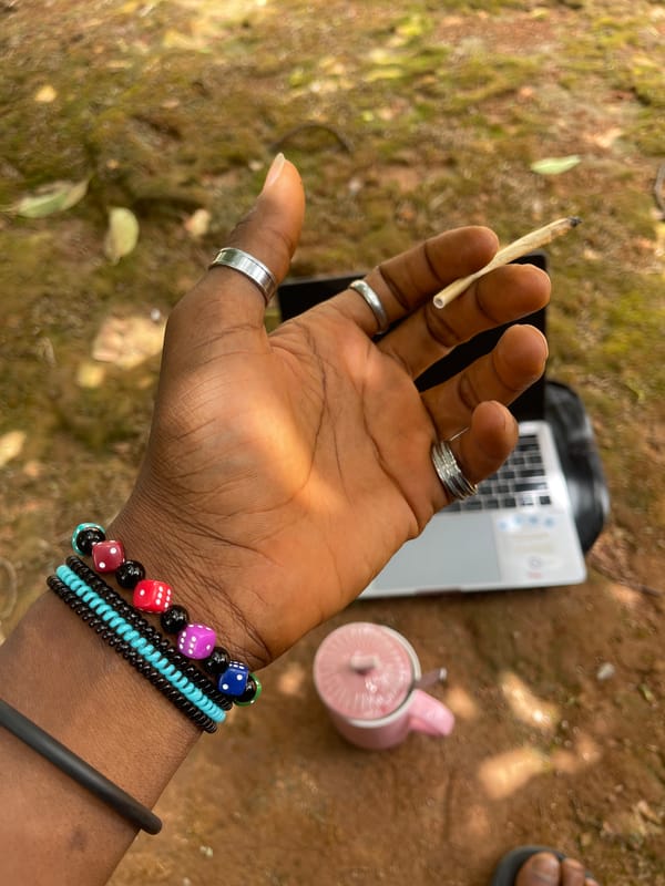 Man smoking outdoors in Jos, Nigeria captured in photographs