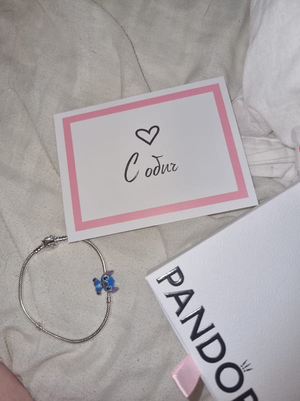 Personal items arranged on linen surface in Saarbrücken