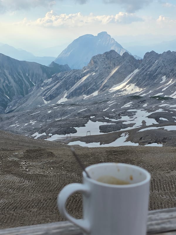 Coffee and mountain views at the Zugspitze on a summer morning