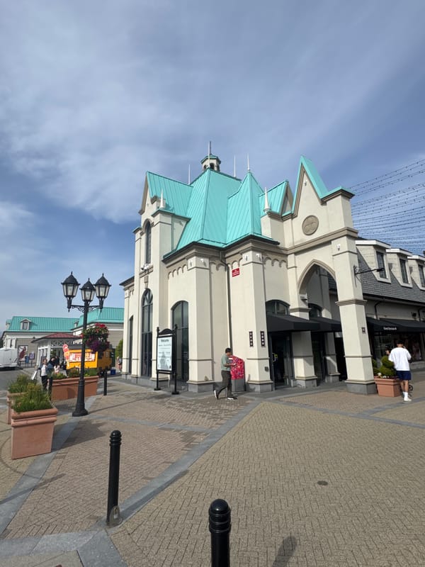 Visitor documents stroll through Richmond designer outlet mall