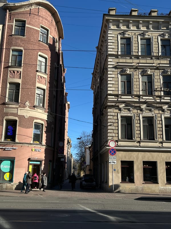 Sunny midday street life documented around St. Petersburg cathedral