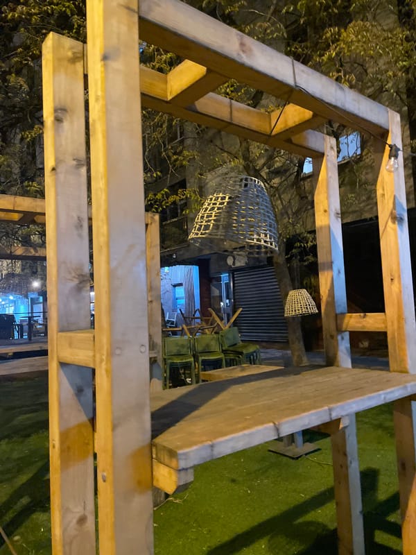 Wooden pergola structure spotted in Novi Sad outdoor setting