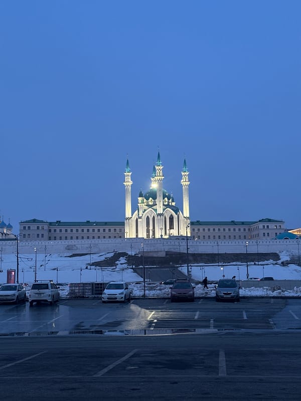 Tourist photographs document Kazan landmarks and street portrait