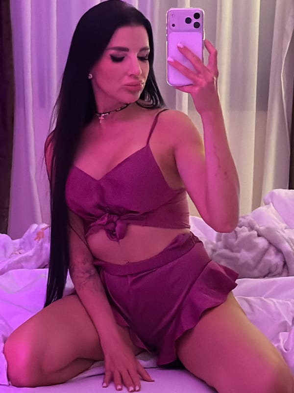 Woman takes bedroom selfies in Montenegro