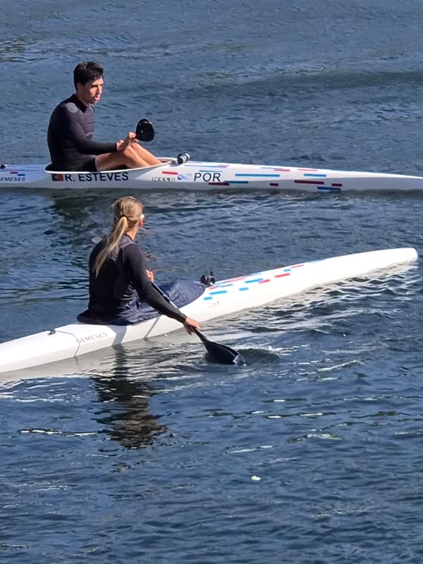 Jet skier cruises Cavado River in Esposende, dog rests nearby