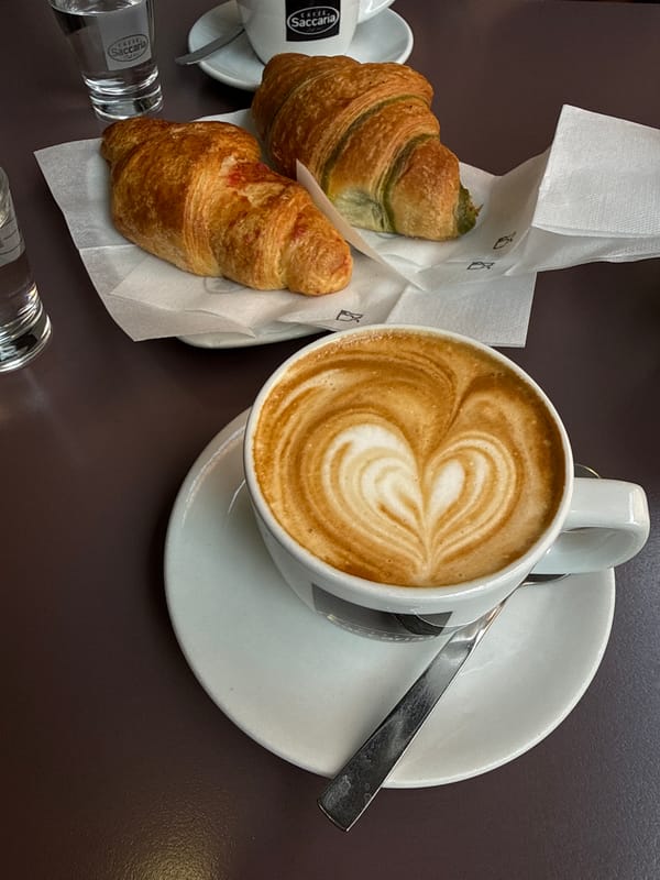 Morning coffee and slot machines at a Bologna café
