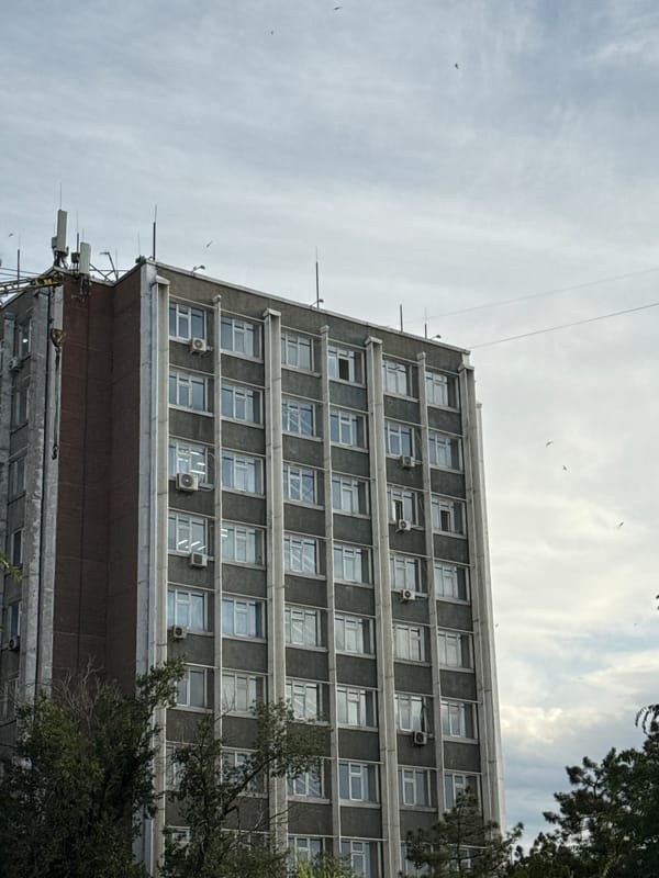 Multiple angles on a modern urban building and its surroundings
