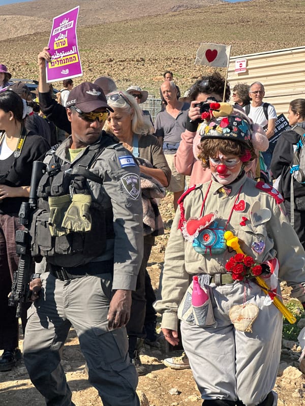 Community gathering documented in Ras 'Ein al 'Auja