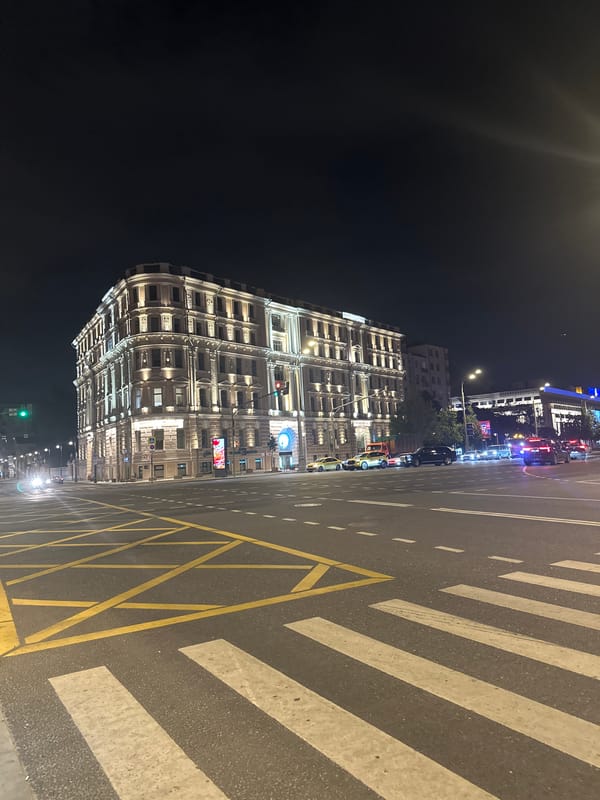 Yandex delivery robot on a Moscow street at night
