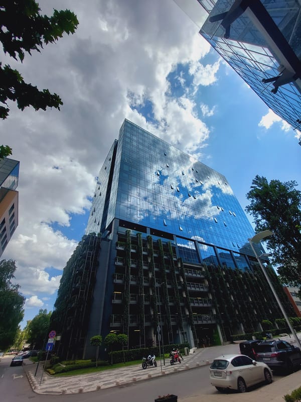 Sofia glass tower with green facade, explored from multiple angles