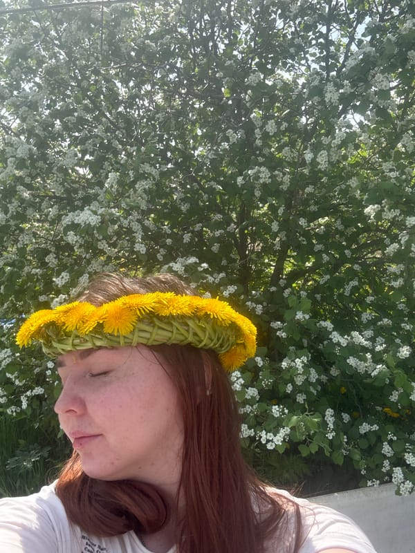 Spring morning portrait session amid dandelion field in rural Russia