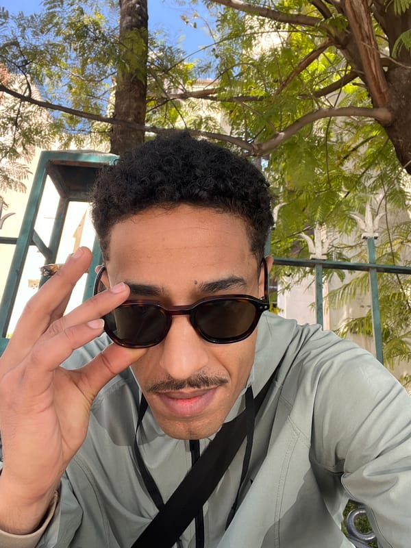 Tourist documents day exploring Meknes, Morocco with multiple selfies