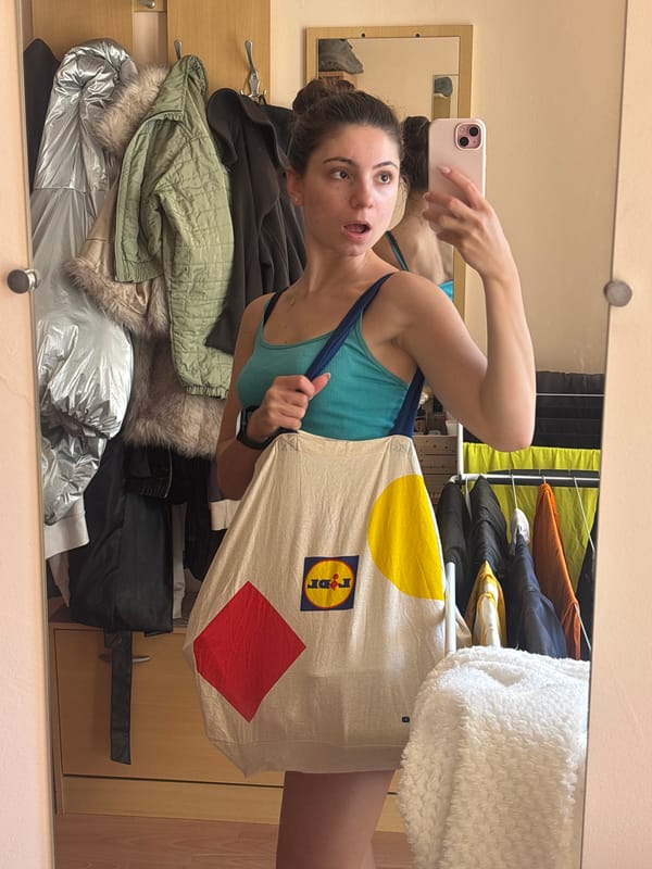 Mirror selfies around a Varna apartment with a Lidl bag