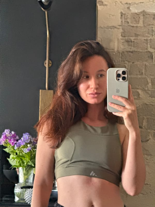 Woman takes mirror selfies in Tel Aviv apartment