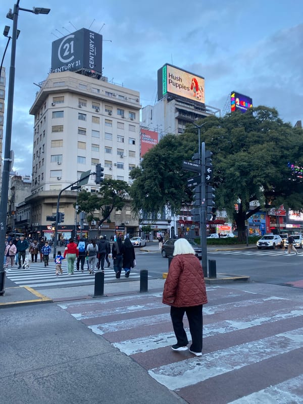 Evening street life documented around Buenos Aires Obelisco district