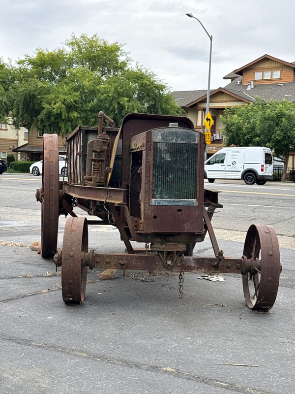 Rusted antique tractor parked in Fair Oaks, California