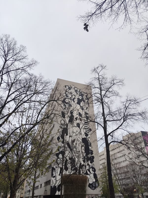 Large crowd mural spotted on Vienna building facade