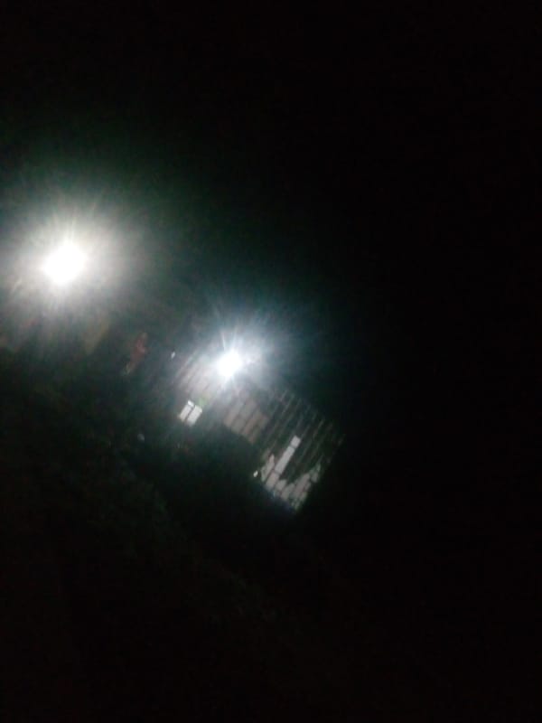 Night ride through Jalingo streets in a yellow auto-rickshaw