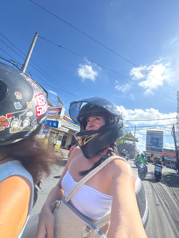 Morning motorcycle activity on busy North Kuta streets