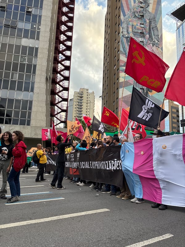 Protesters march through São Paulo streets under police watch