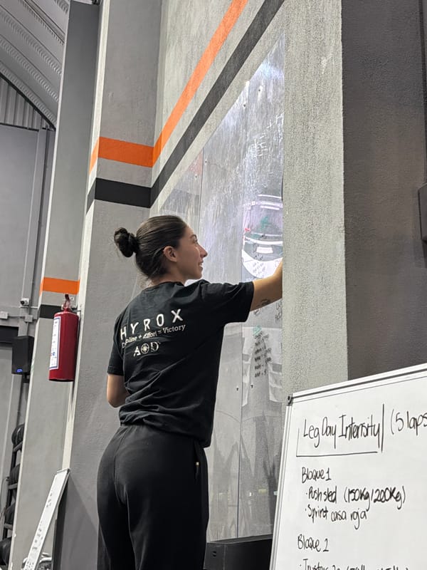 Woman studies workout routine at Mexico gym