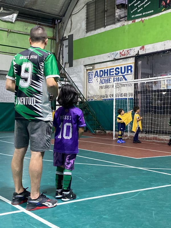 Evening futsal and coffee moments documented in Wilde, Argentina