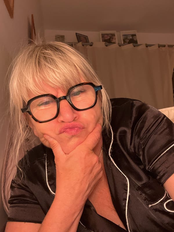 Woman in silk pajamas captured in bedroom moments