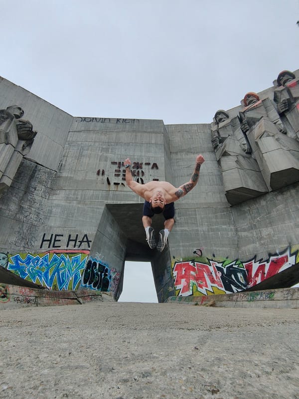 Man performs backflips at Soviet friendship monument in Varna