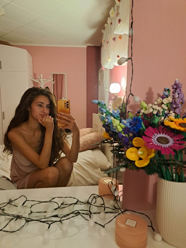 Woman takes selfies, colorful flowers and dramatic sky captured
