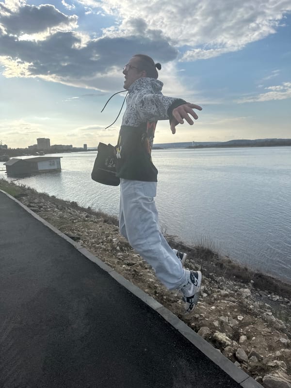 Casual riverside gathering observed along Volga River in Engels