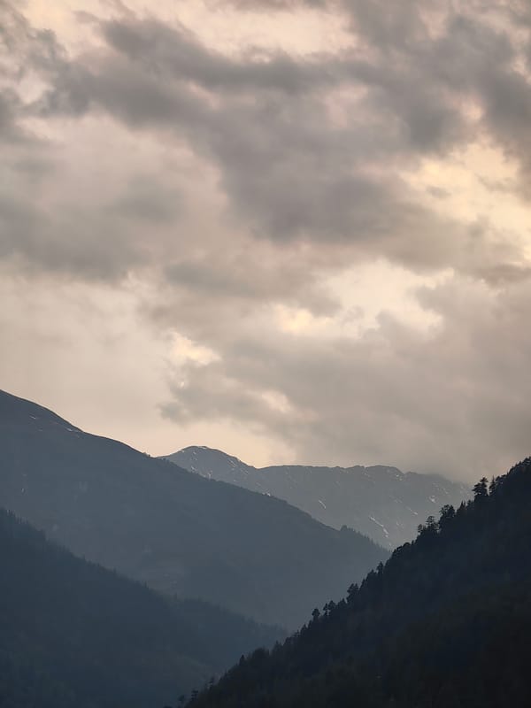 Monsoon afternoon documented across Vashisht's mountain terraces and rooftops