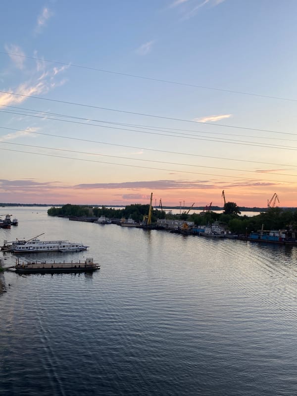Summer evening on the Volga: river, boats, and dusk over Novokuybyshevsk