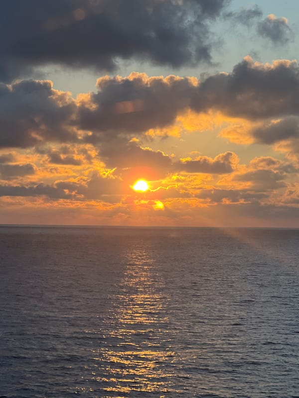 Dramatic cloud-streaked sunset over the South China Sea