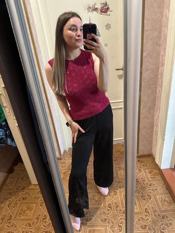 Mirror selfies in a Yaroslavka home, lace-knit top