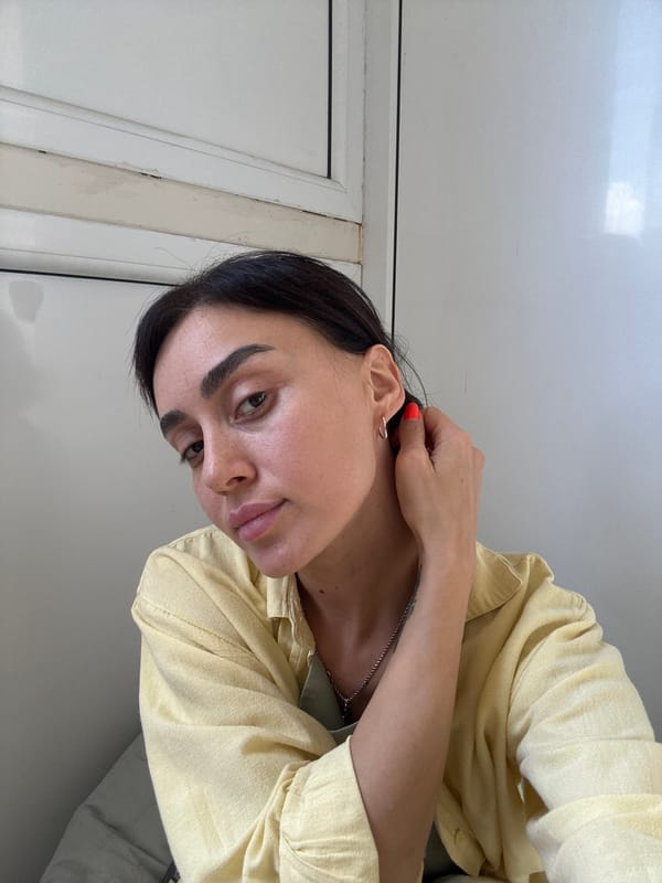 Casual morning at a Tbilisi workspace, selfies and sticky notes