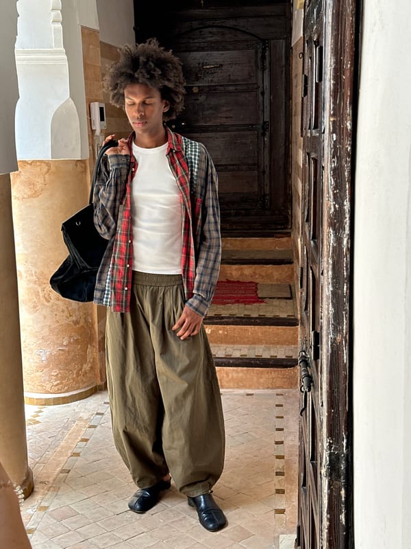 Young man observed in tiled building in Marrakesh