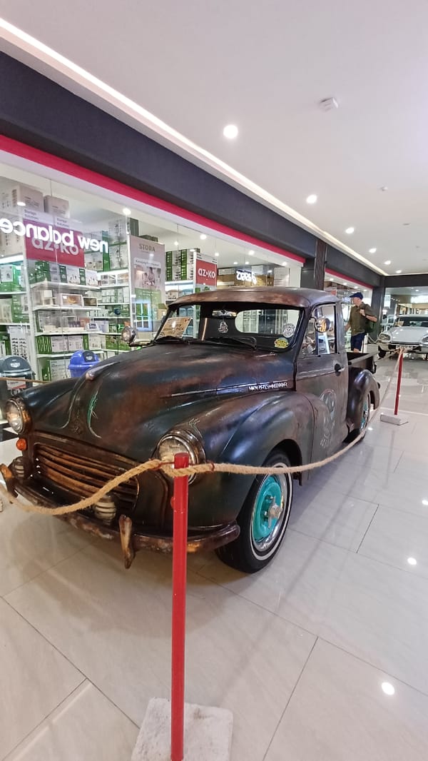 Vintage car show displays classic vehicles in Kuta mall