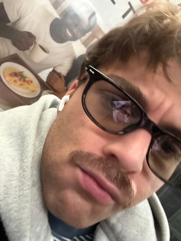 Person takes casual selfies indoors in Montreal