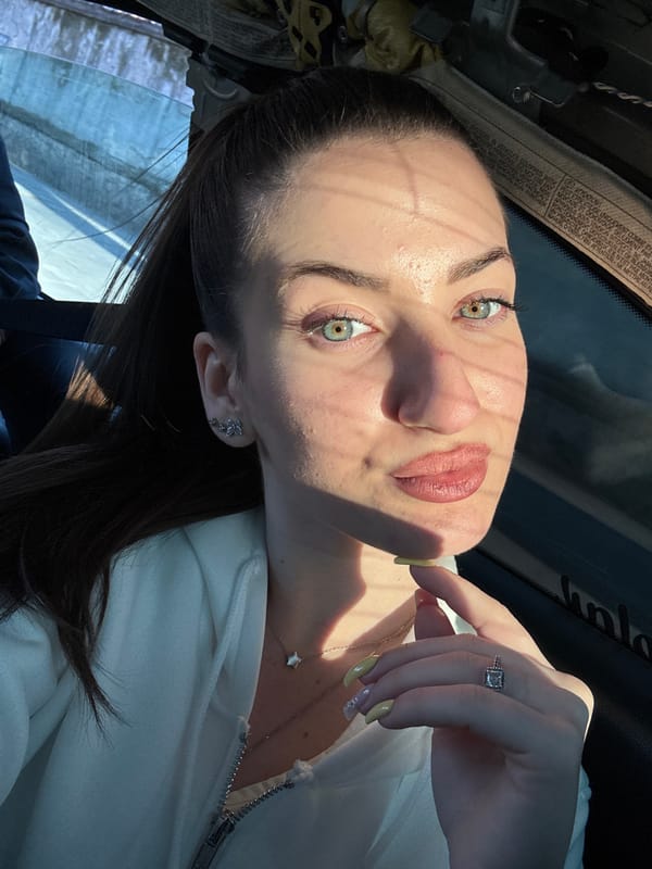Woman takes selfie in vehicle in Plovdiv, Bulgaria