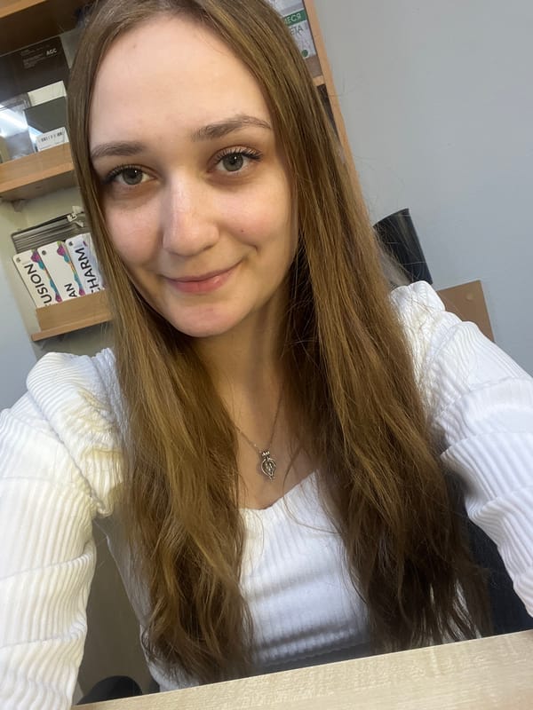 Woman takes selfies at workspace in Verkhnyaya Pyshma