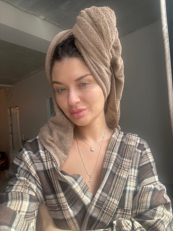 Woman in towel photographed with baby in Moscow area