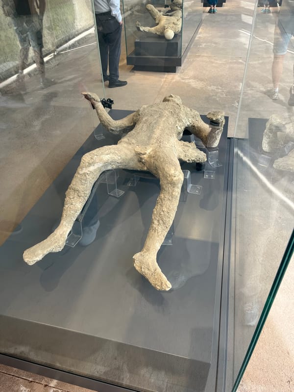 Tourist documents afternoon visit to Pompeii archaeological ruins