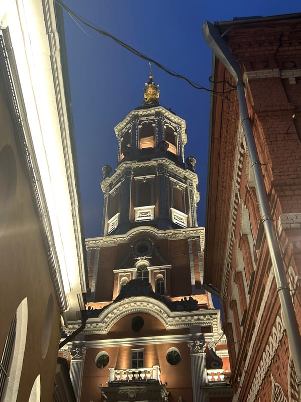 Moscow resident documents architecture, books, vintage TVs in afternoon walk