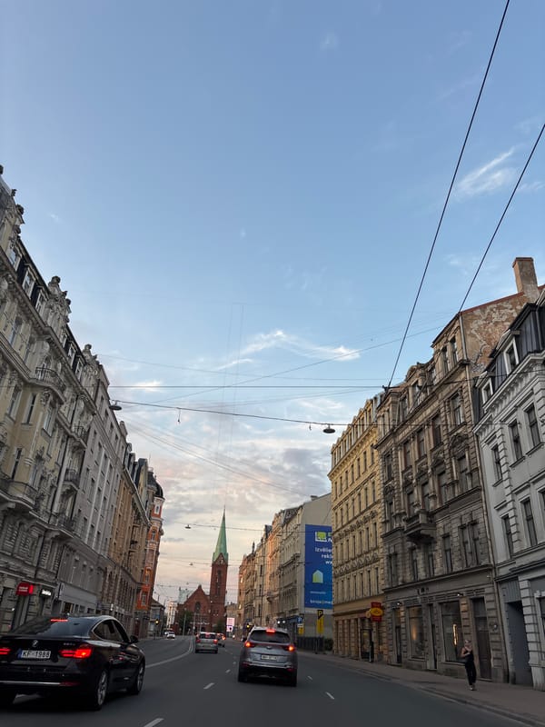 Evening stroll through Riga's classical streetscape near Dailes Teatris