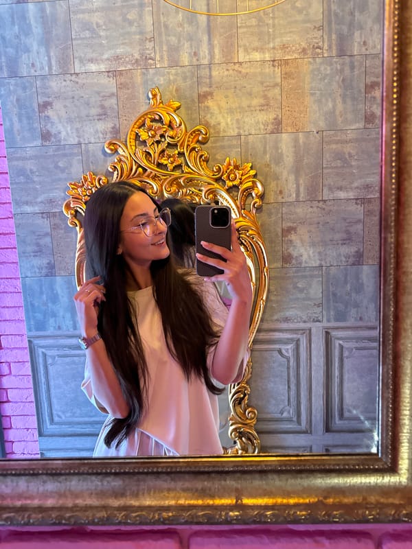 Woman takes mirror selfies in decorated Sofia interior